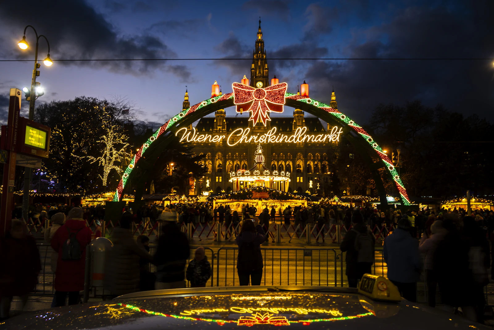 Vienna's Christmas market in front of the Rathaus at dusk