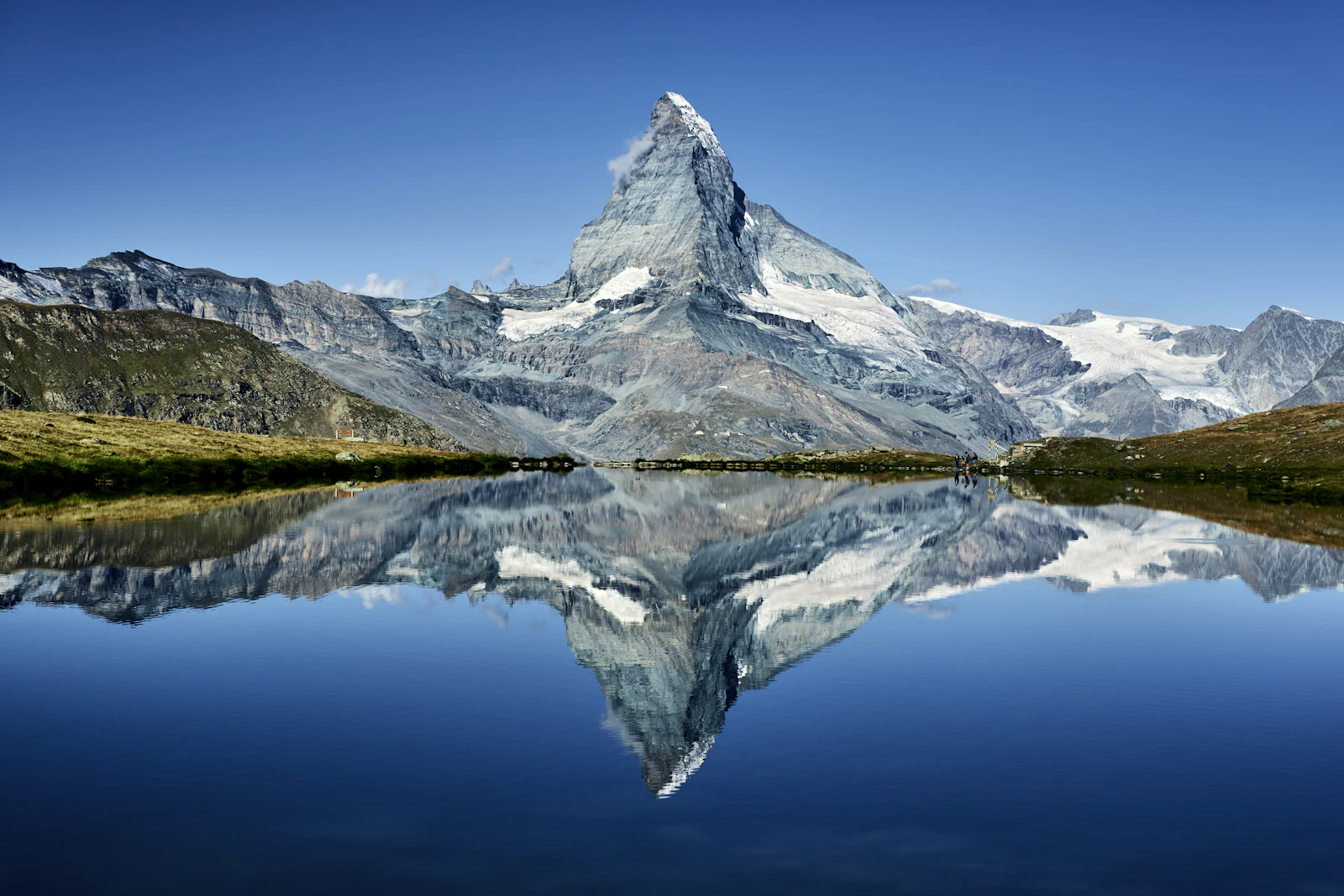 The Matterhorn reflected in a still mountain lake